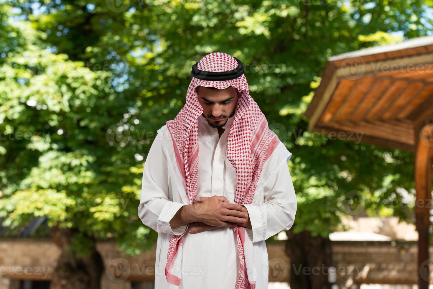 Young Muslim Man Praying photo