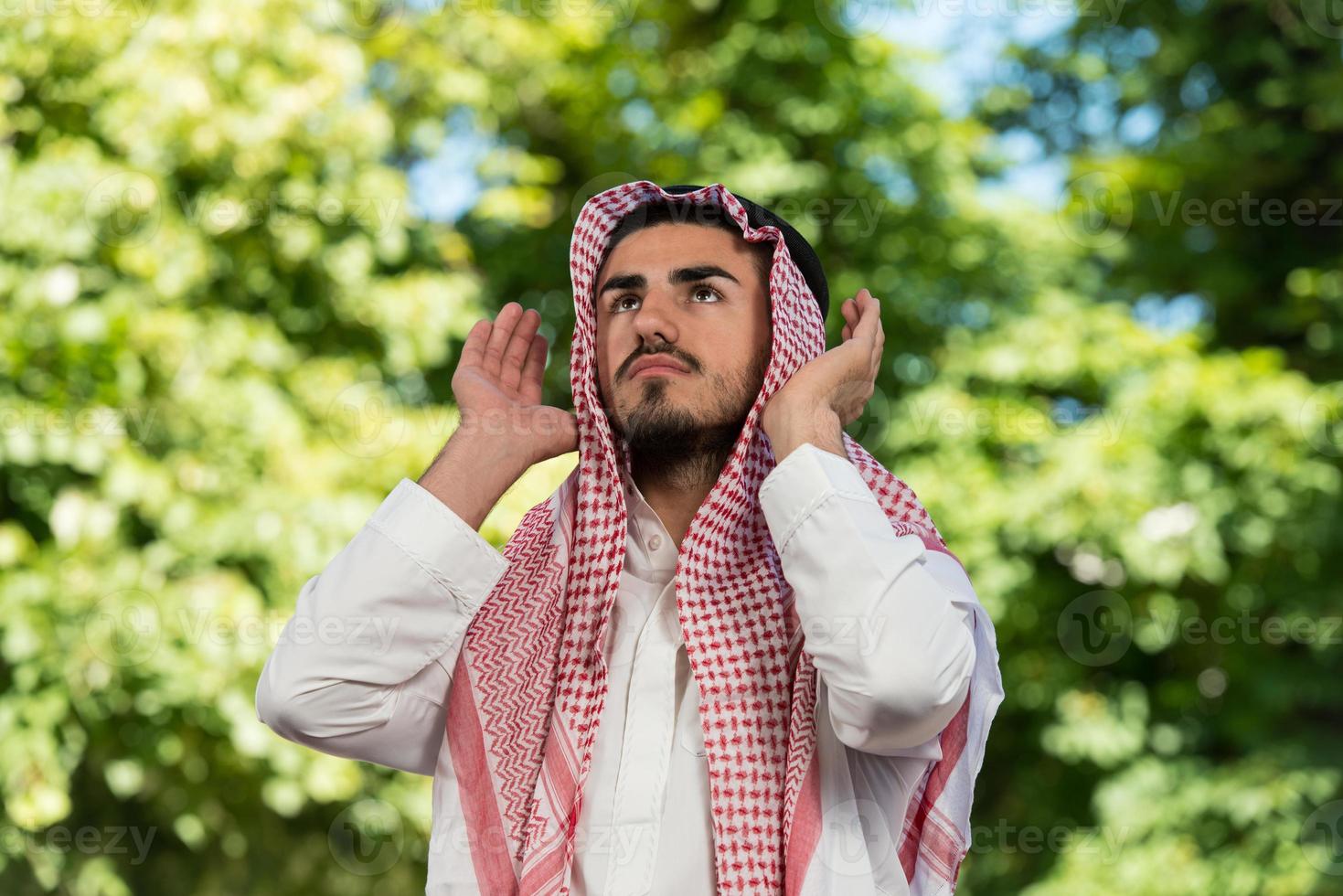 Young Muslim Guy Praying photo