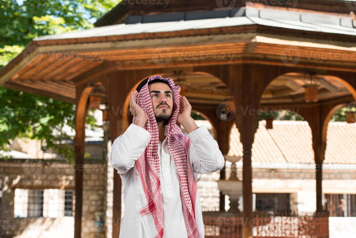 Young Muslim Man Praying photo