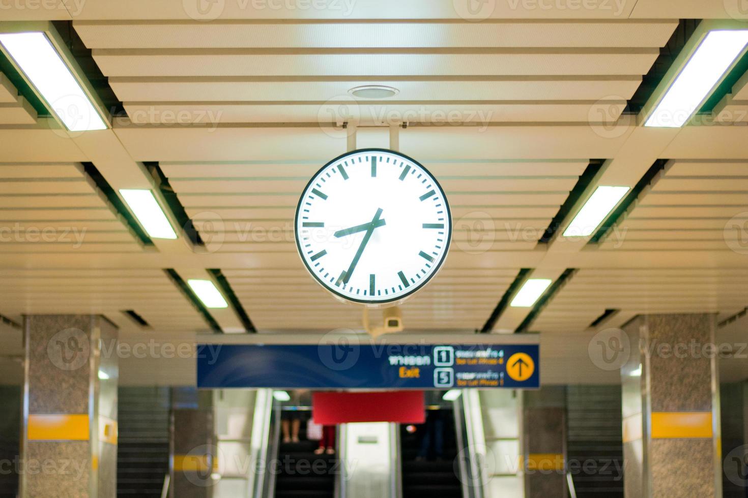 Clock at Thai subway platform photo