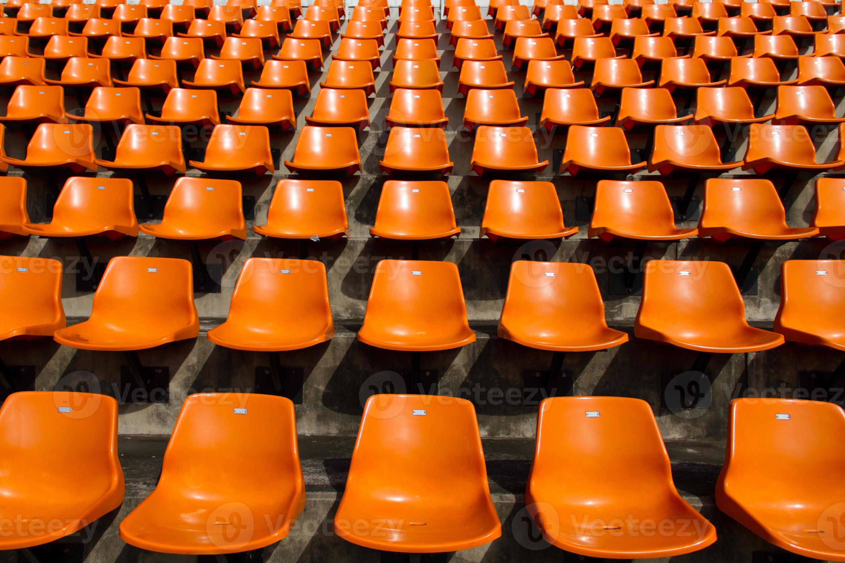 Front of the orange seats on stadium 1216480 Stock Photo at Vecteezy