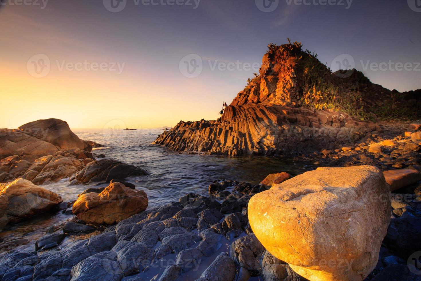 plate terraced basalt rock at Phu Yen sea, Vietnam photo