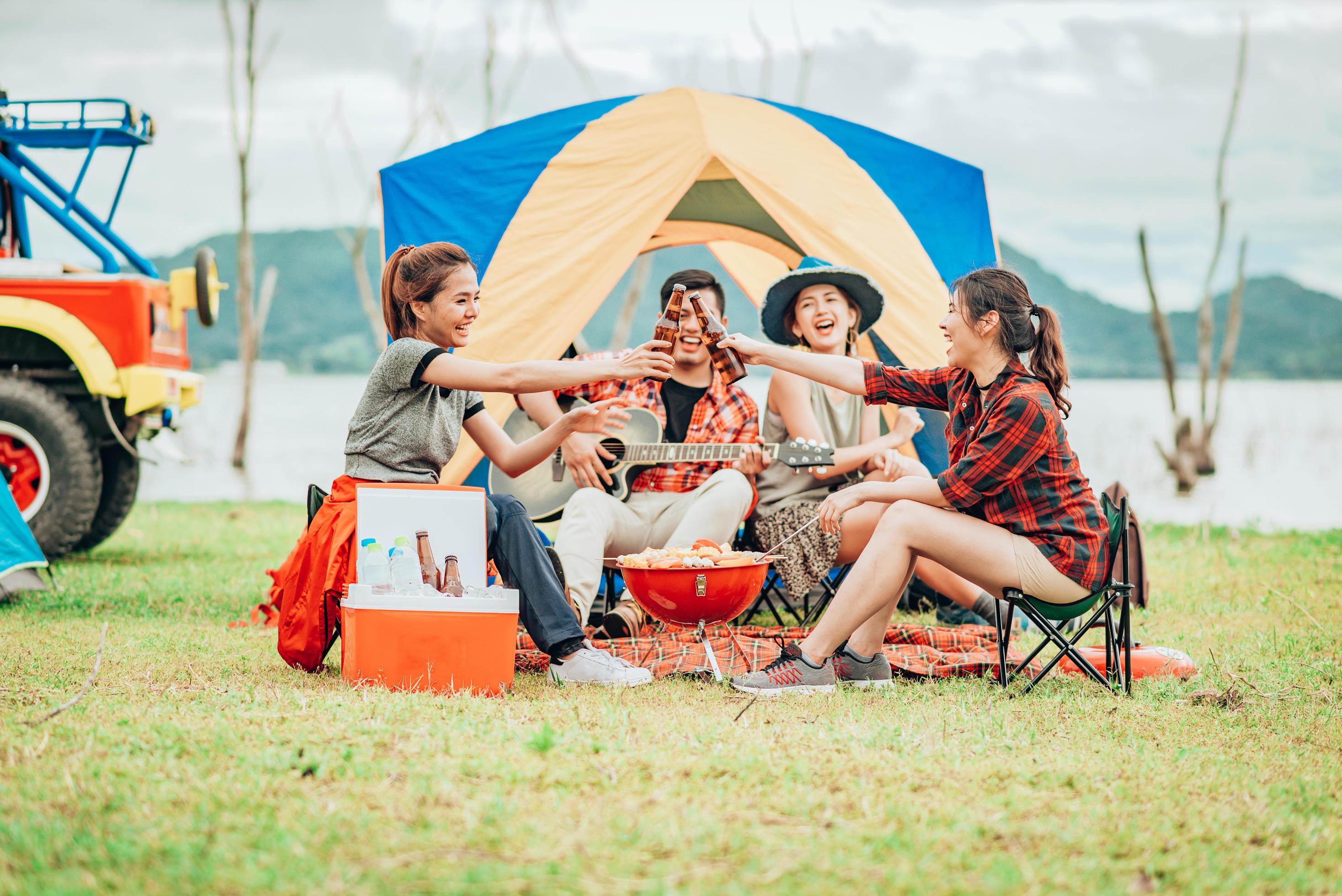Camp group. Friends in the camp. photos people summer holidays tent. camping friends, chairs, tents, sunny.. beer friends.