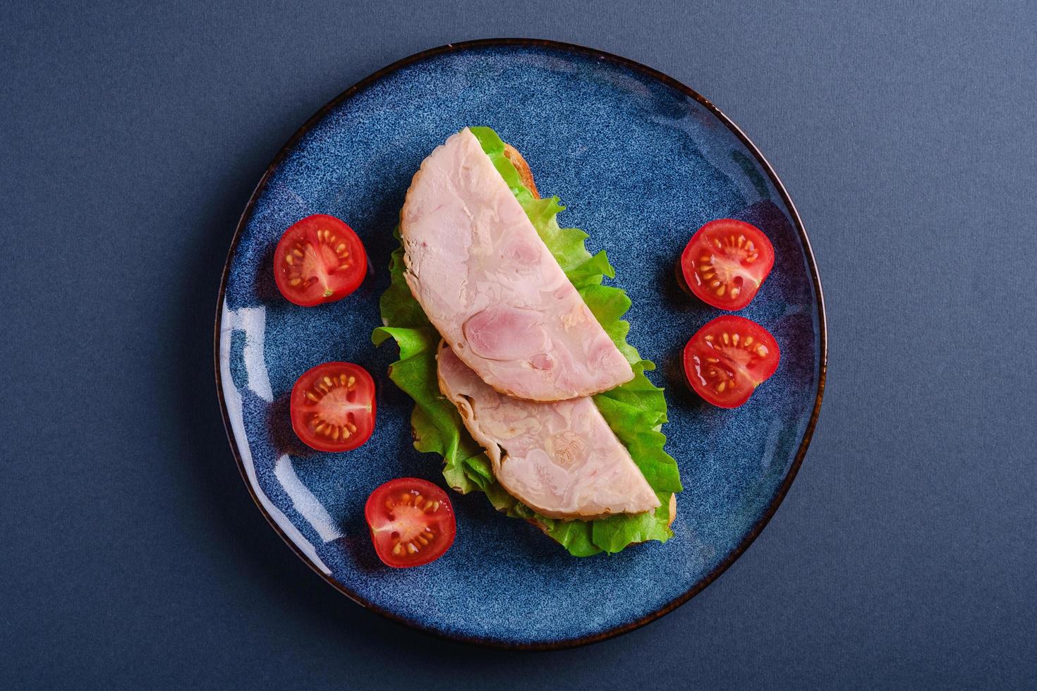 Sandwich with turkey ham meat, top view photo