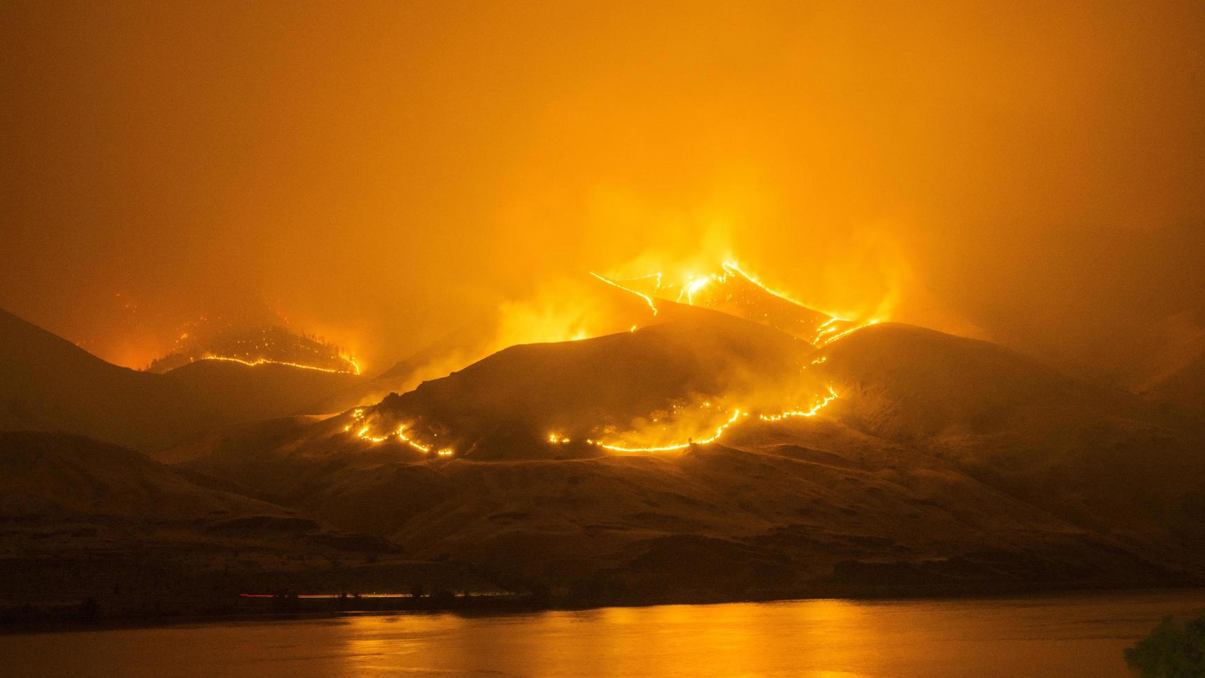 Wildfire on mountains photo