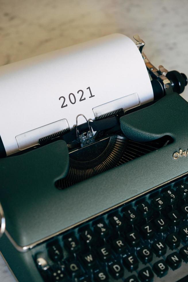 Green typewriter with 2021 typed out photo