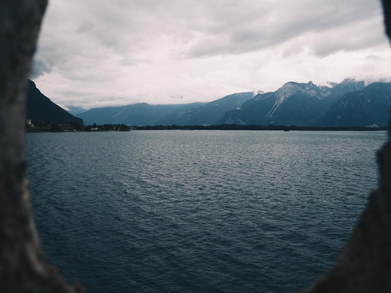 View of the ocean near mountains photo