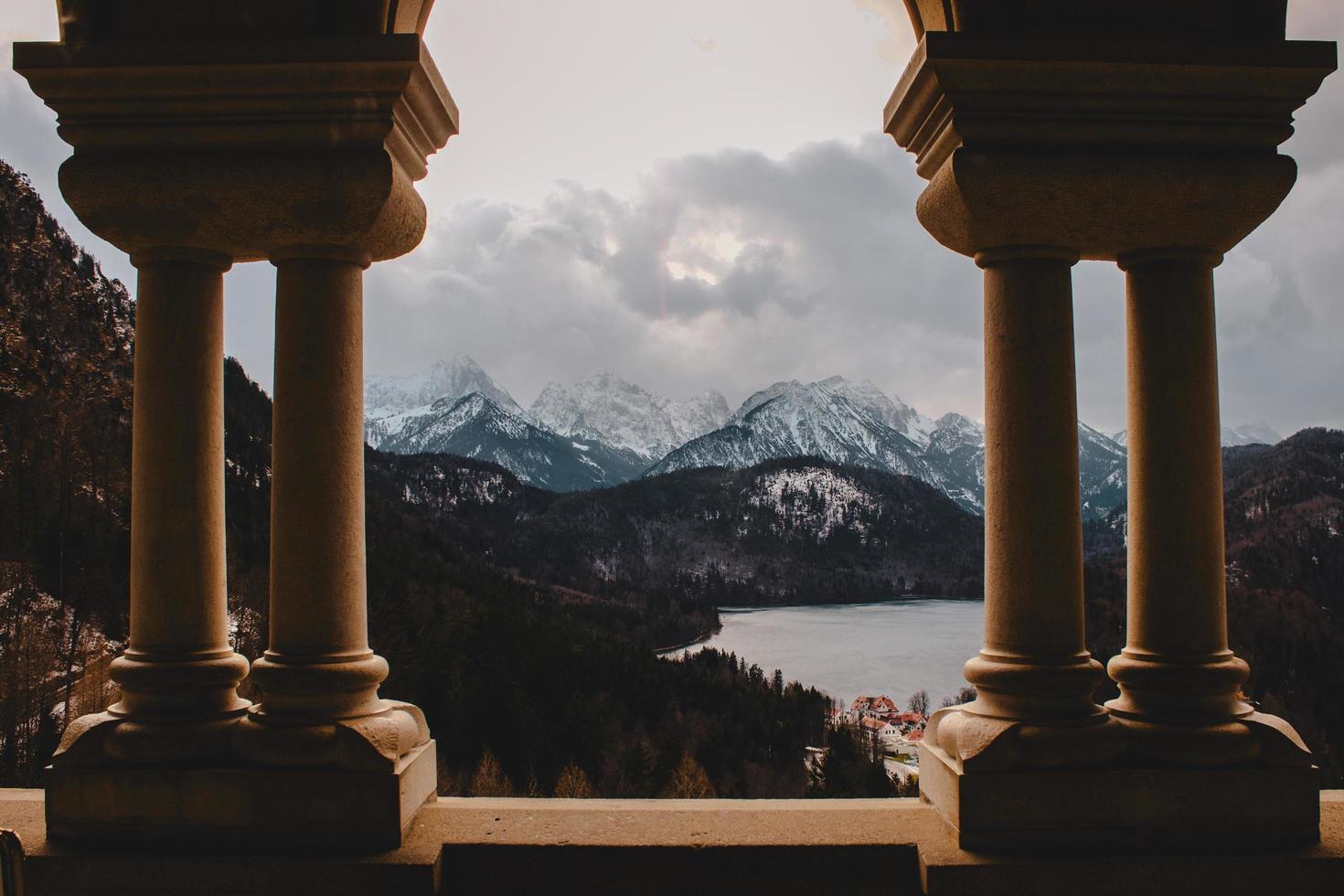 Mountain range framed by columns photo