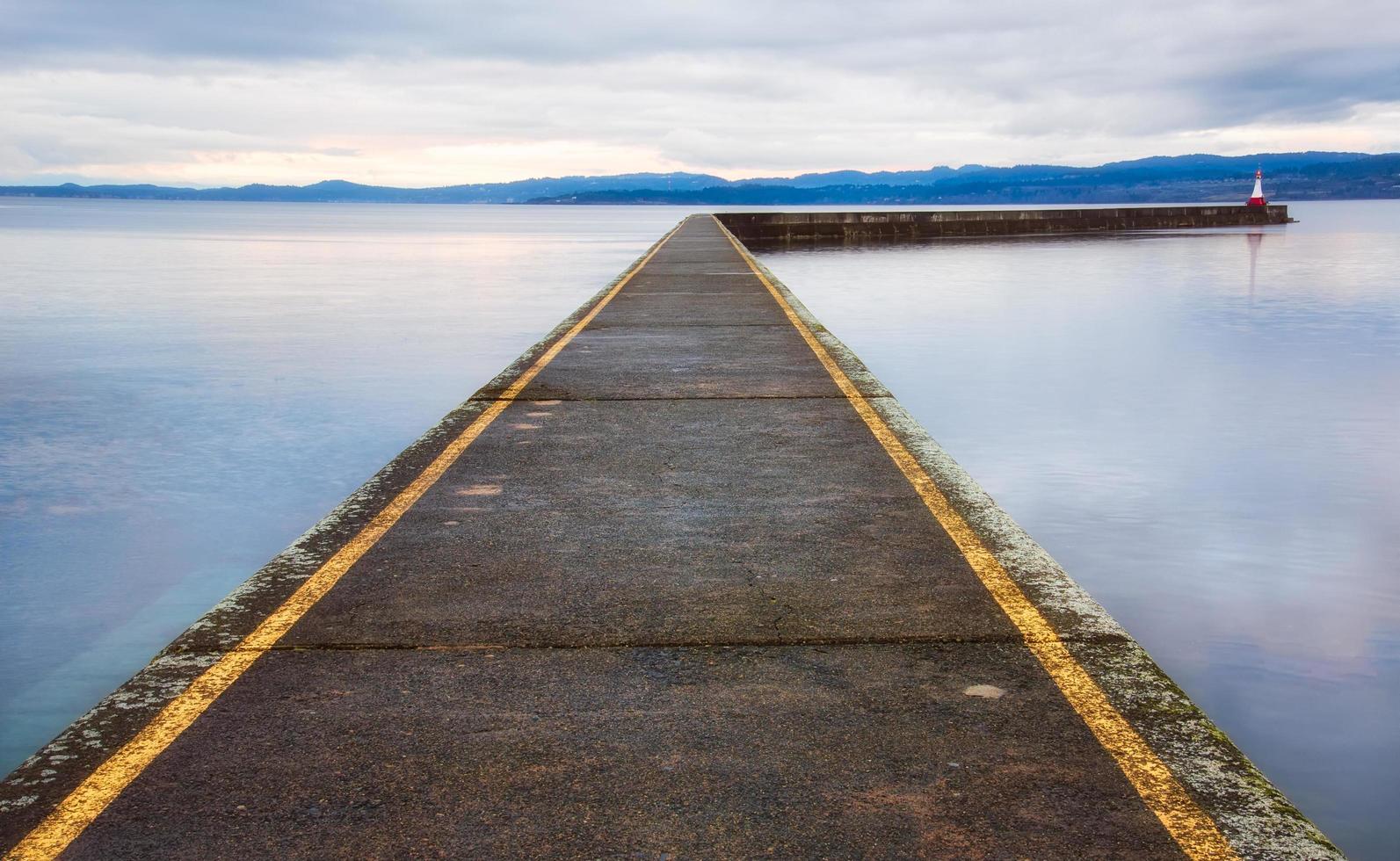 Dock surrounded by water photo