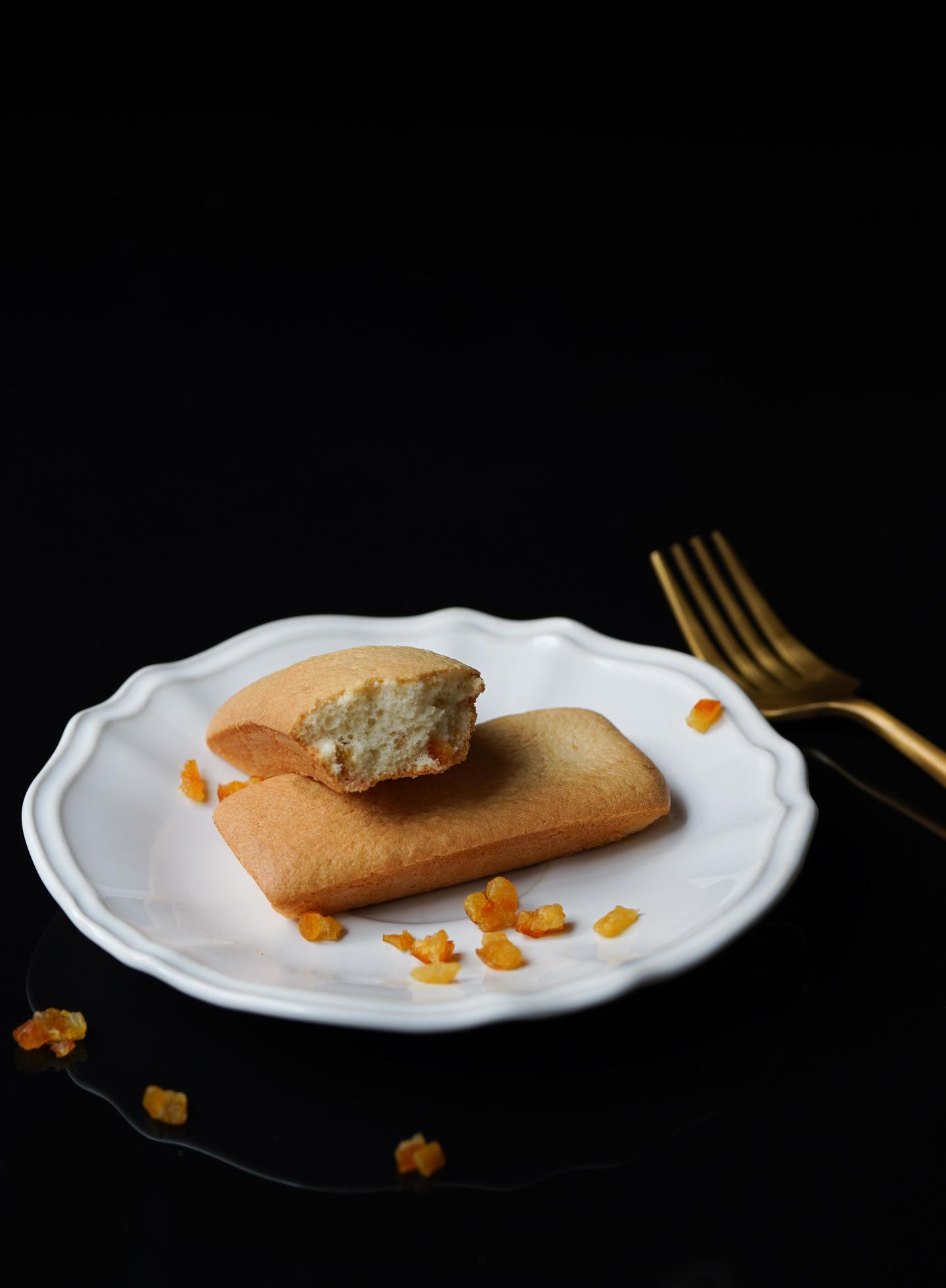 Pastry on plate on black background 1226208 Stock Photo at Vecteezy