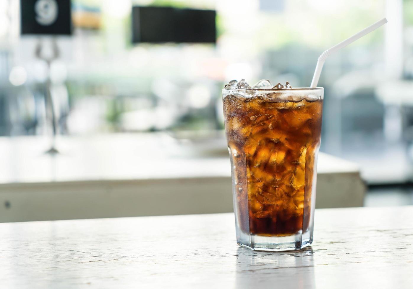 Iced soda on table photo