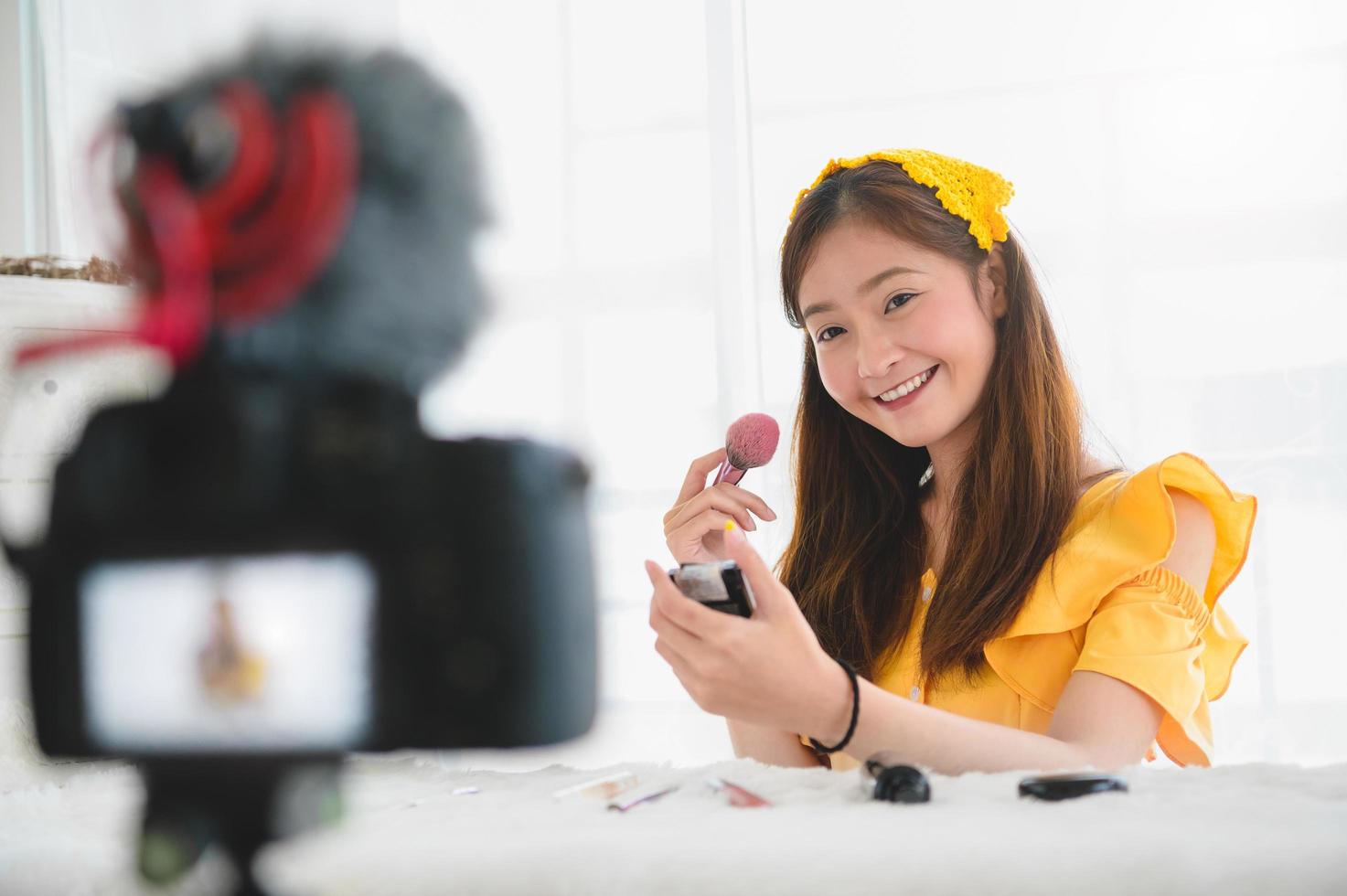 Beauty blogger creating makeup tutorial  photo
