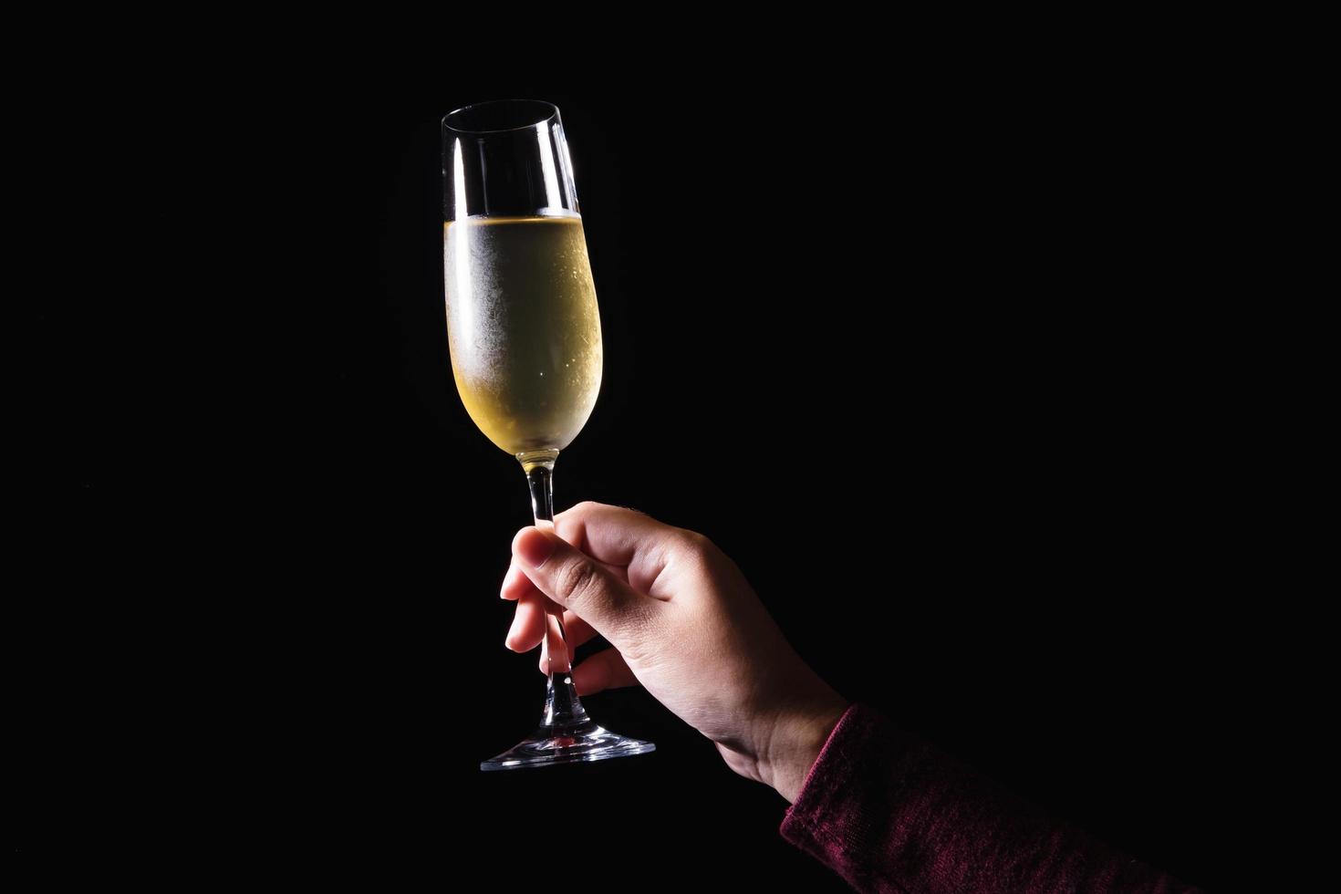 Hand holding glass of champagne  photo