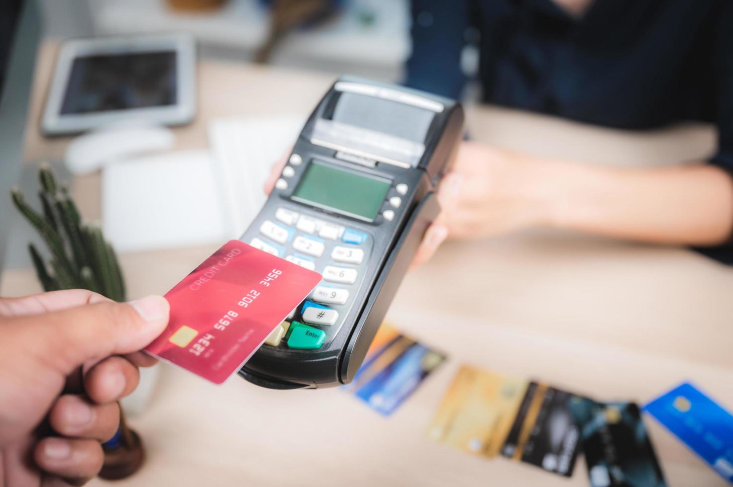 Consumer is paying for service with credit card  photo