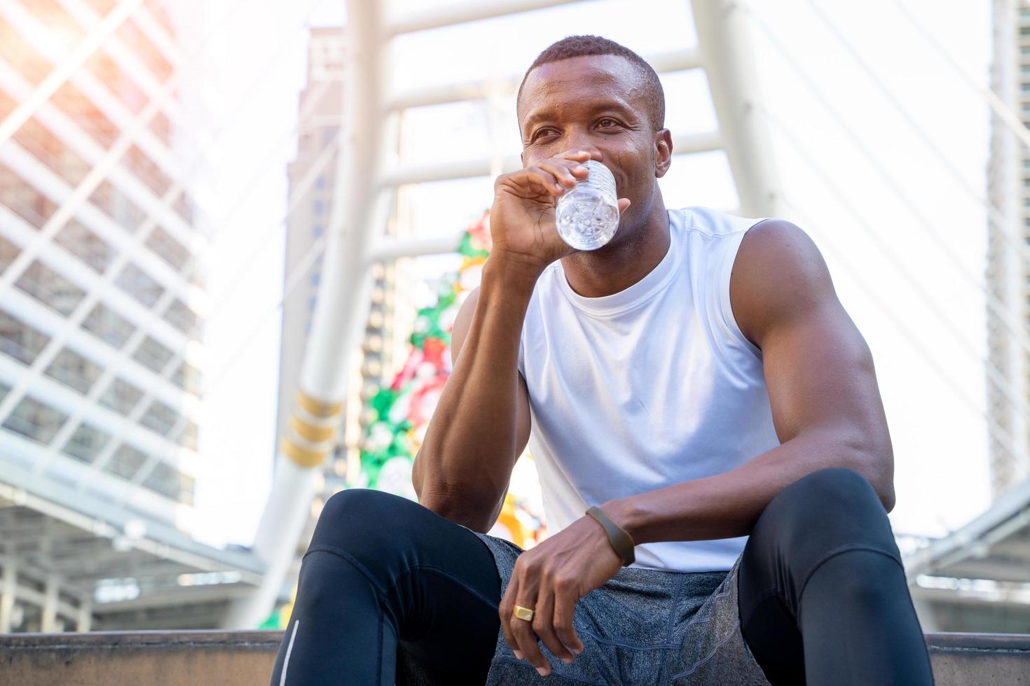 Athlete drinking water photo