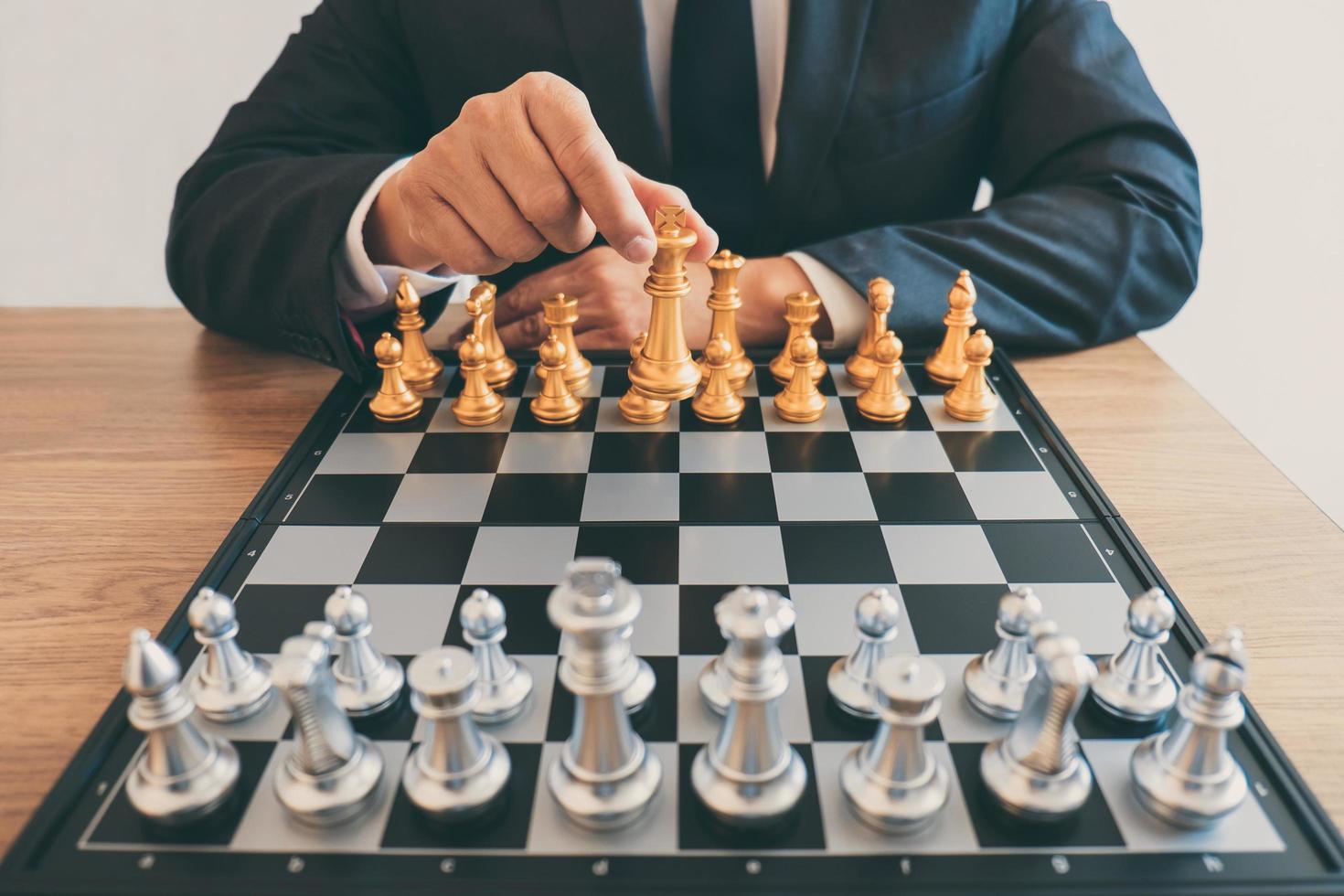 Man playing a game of chess photo