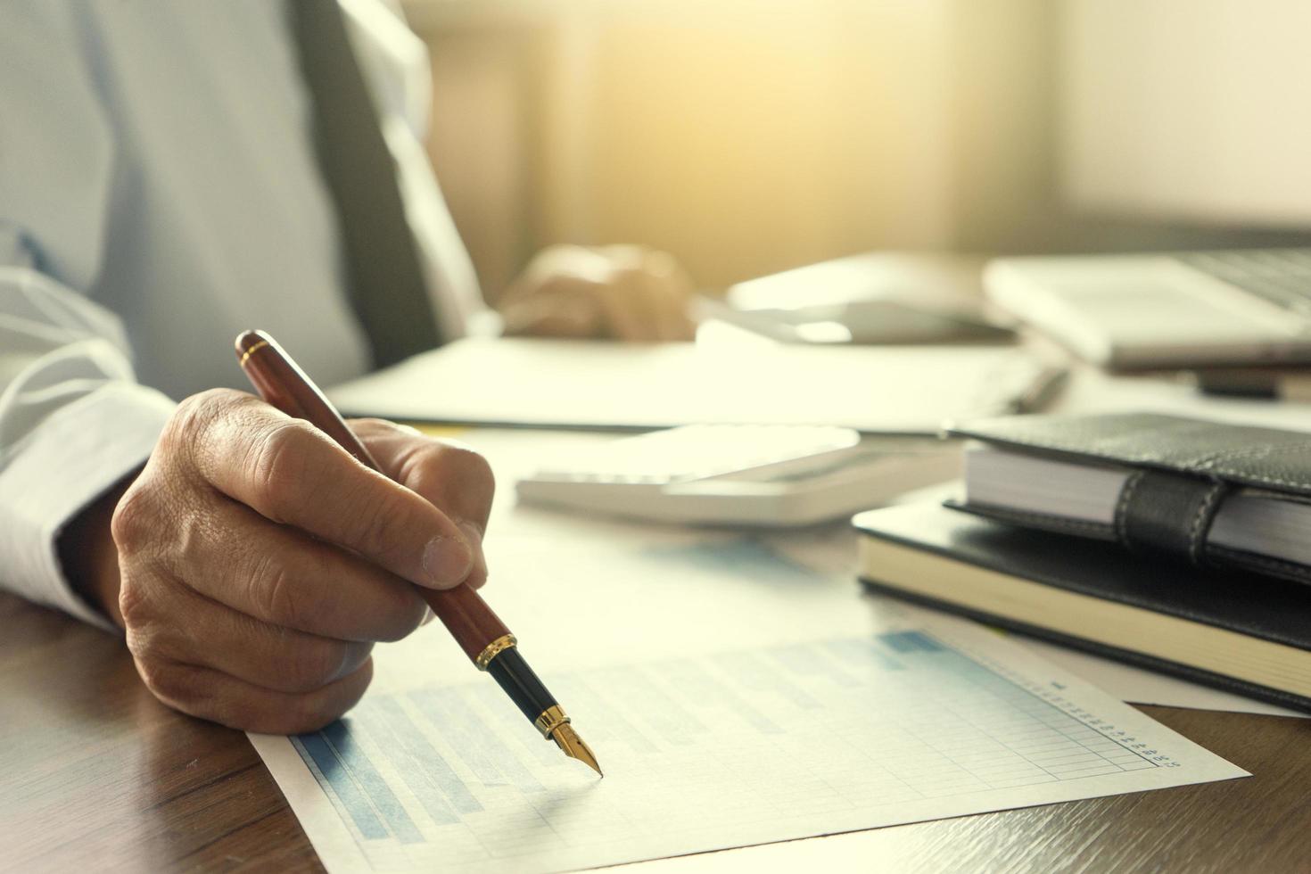 Businessman working at desk  photo