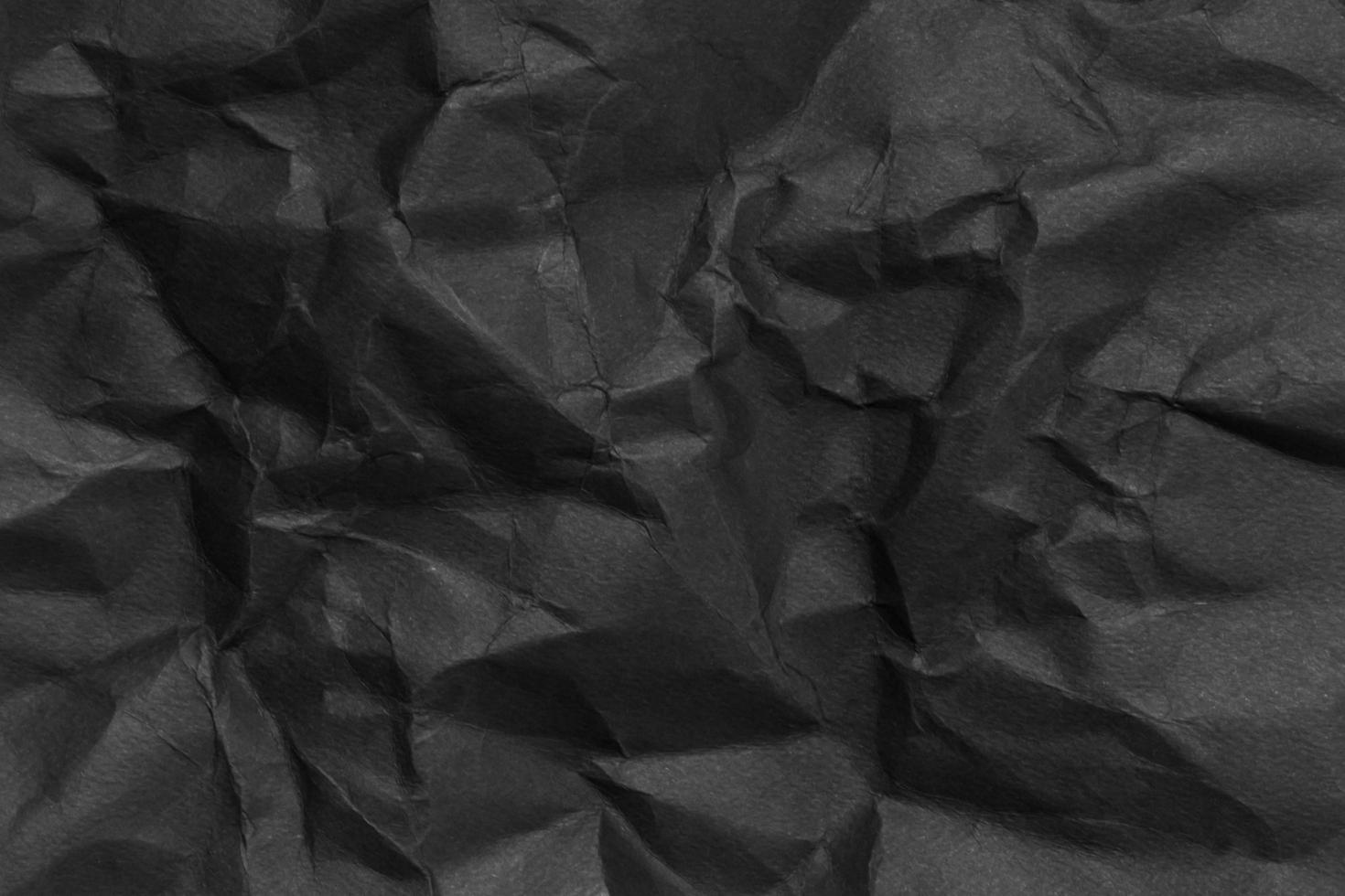 textura de papel negro arrugado foto