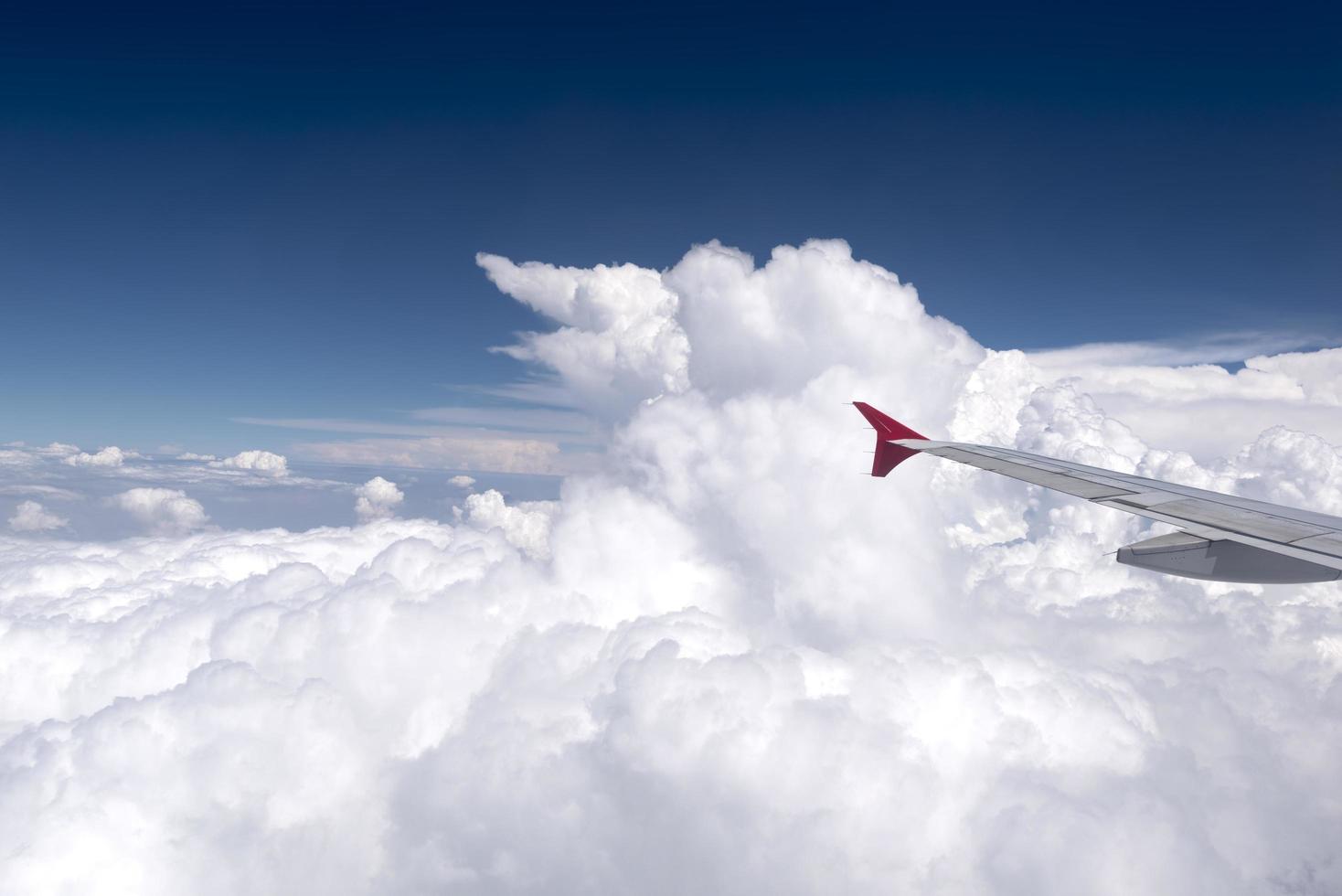 View of airplane wing from passenger window photo