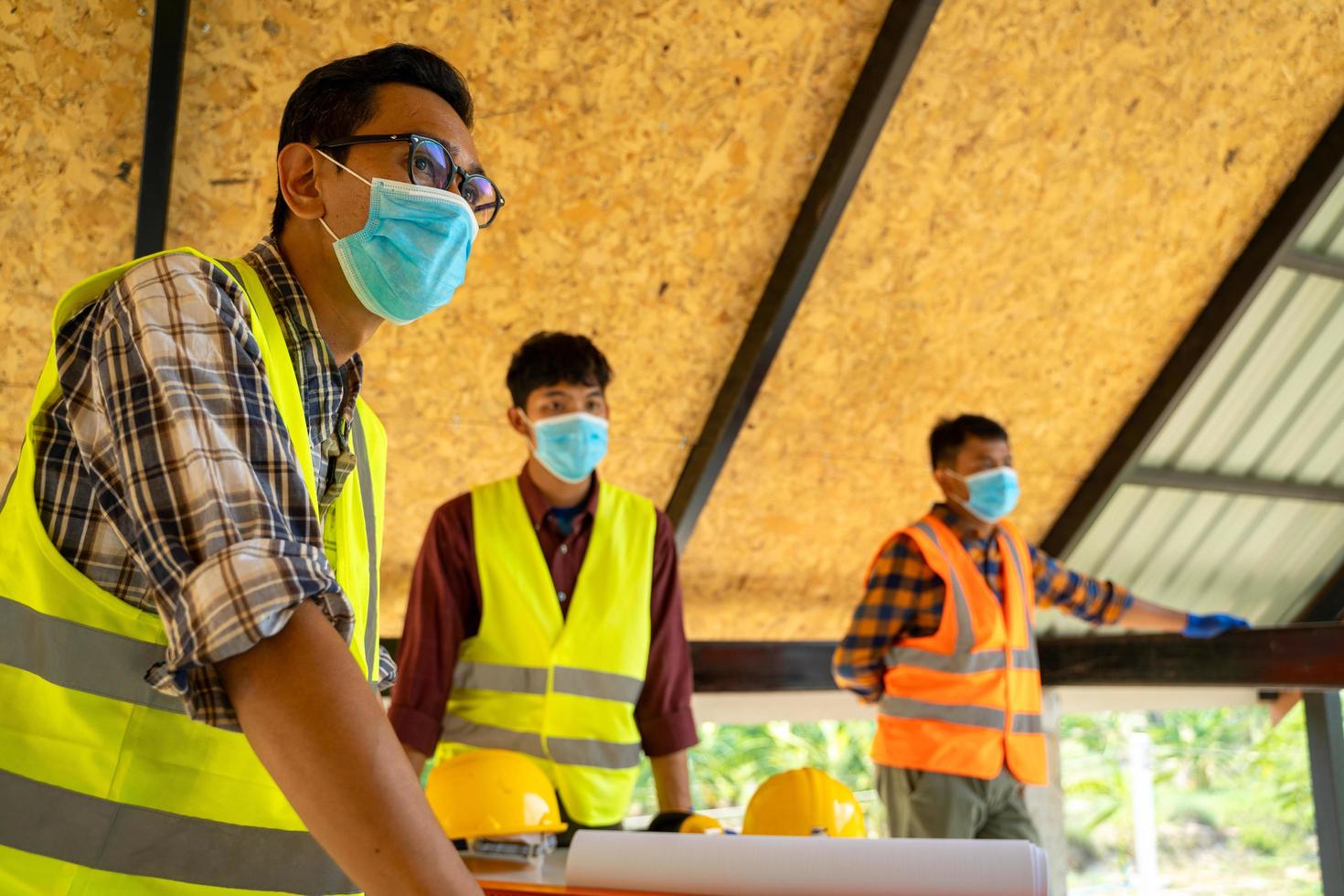 Engineer and architects on construction site photo