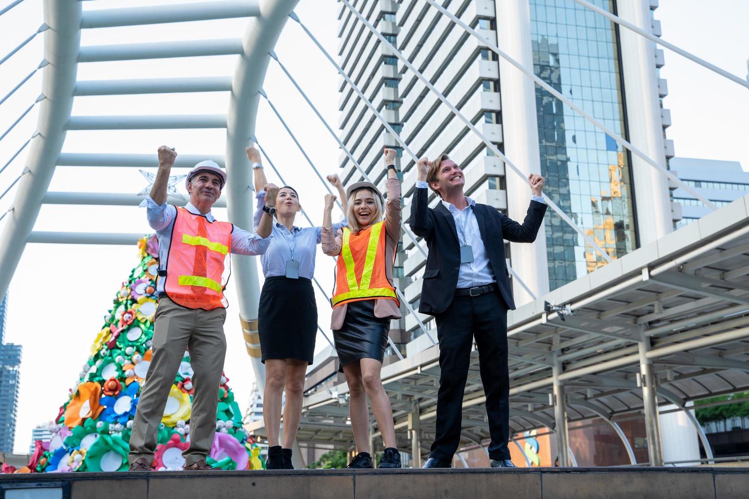 Business men and women celebrating photo