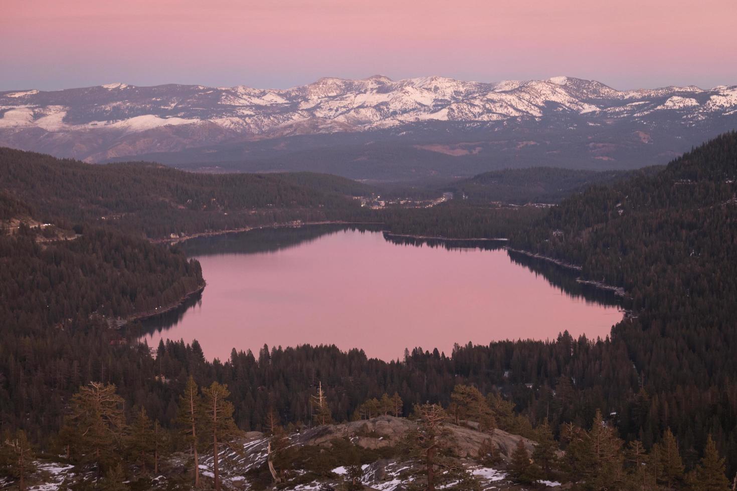 Aerial view of lake surrounded by trees photo