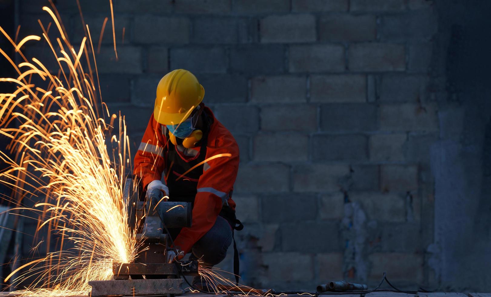 Worker wearing protective mask to Protect Against. photo