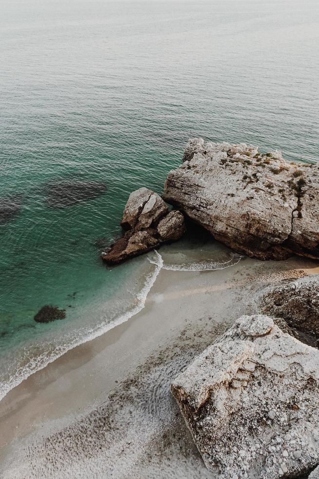 Moody rocky seashore photo