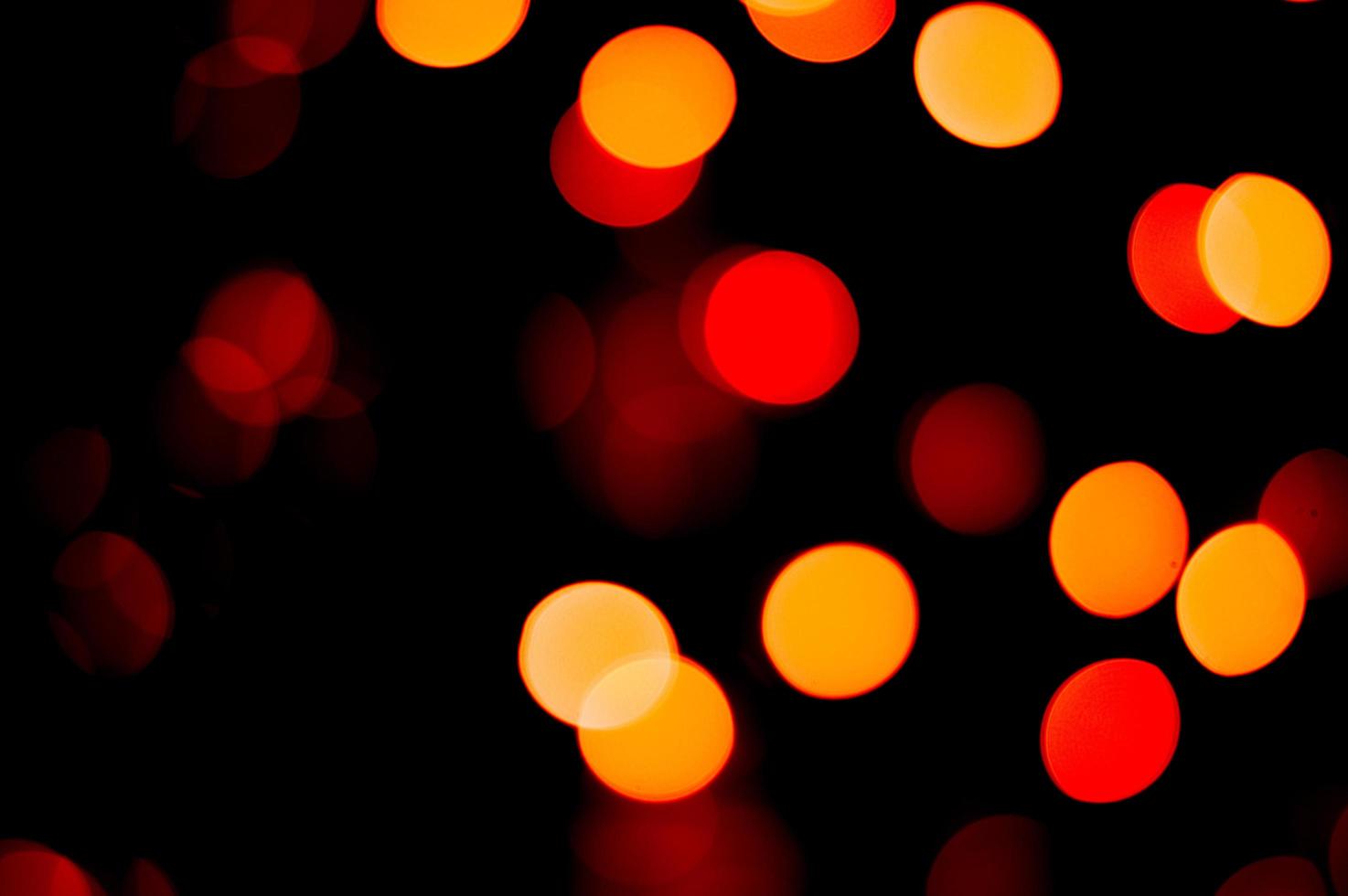 Out of focus red and yellow lights photo