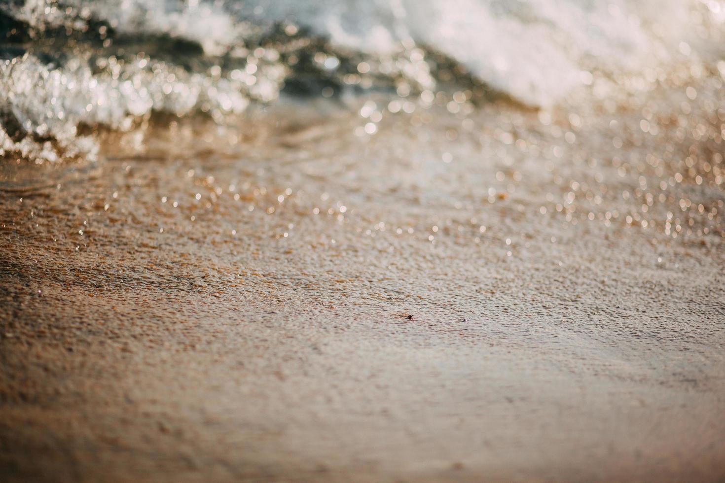 primer plano de arena en una playa foto