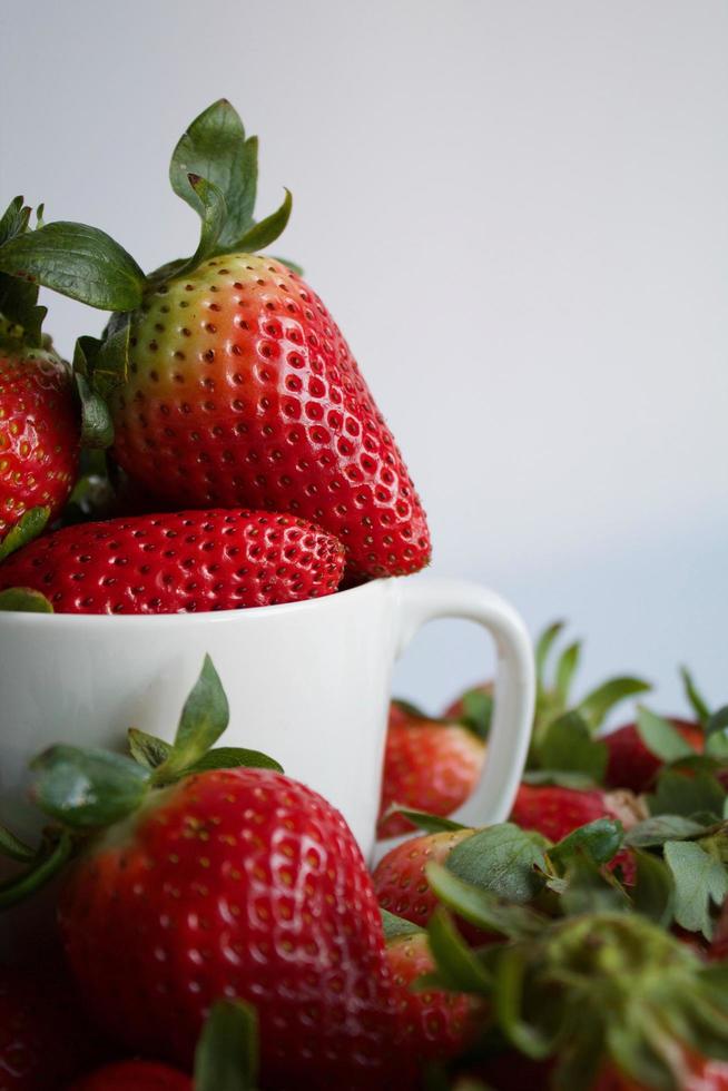Strawberries in a mug photo