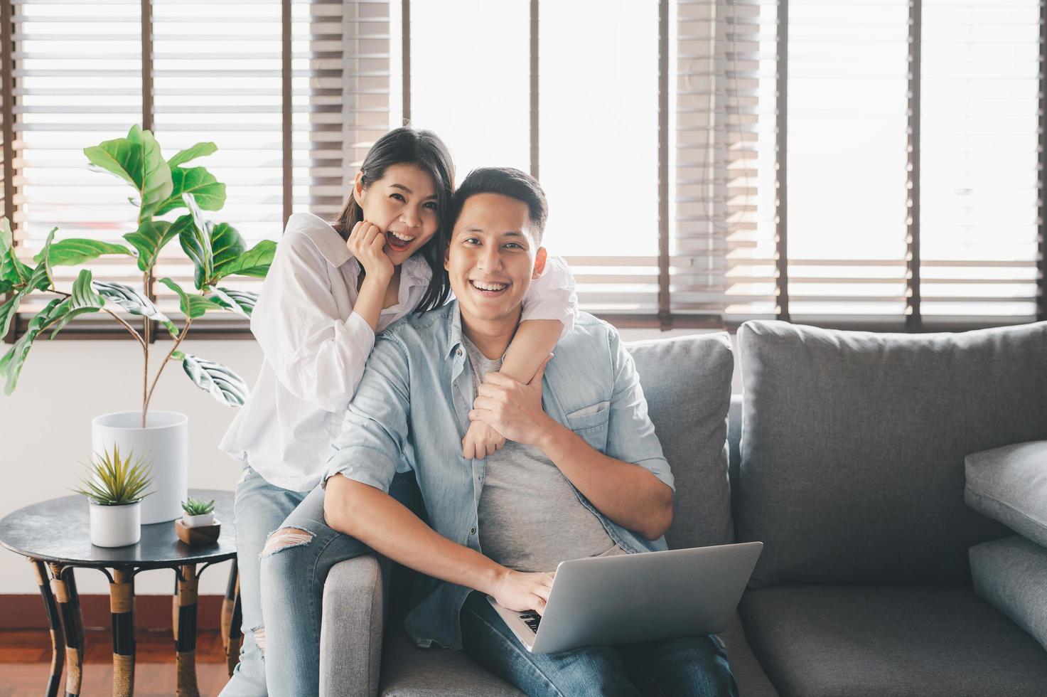 Happy Asian couple having a good time photo