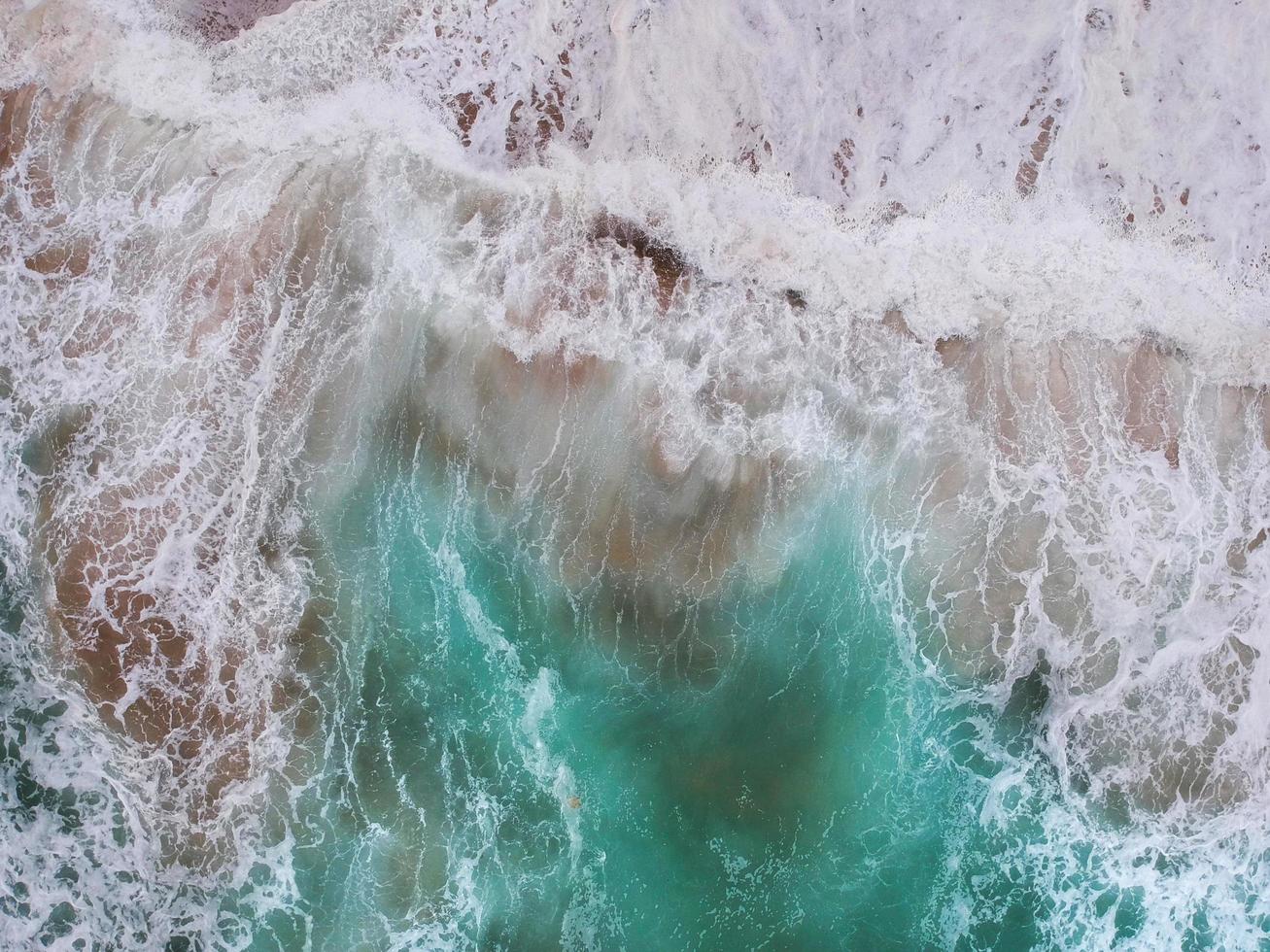 Ocean waves from above photo