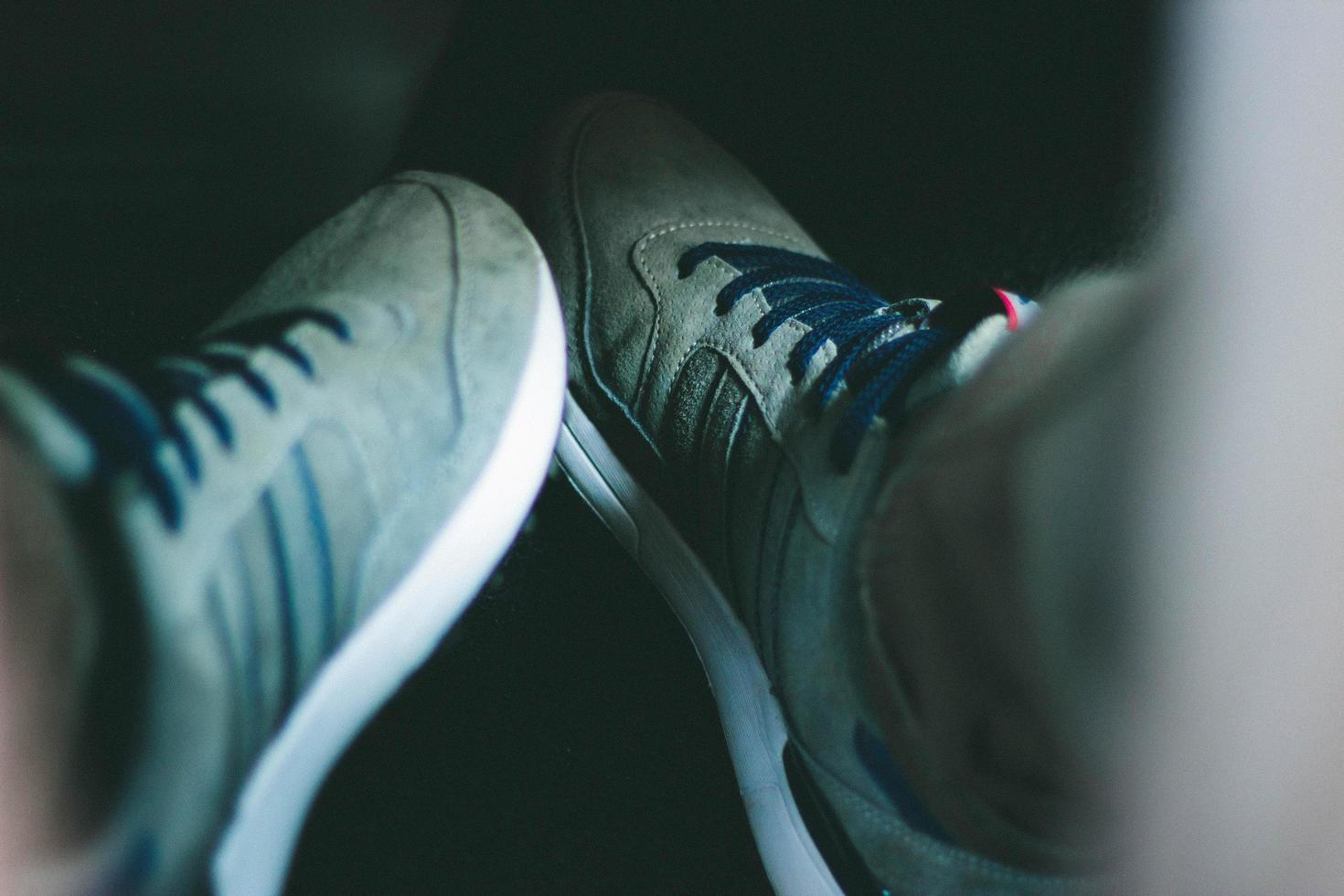 Closeup of gray sneakers photo