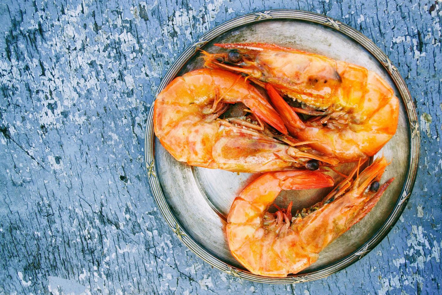 Three cooked shrimps photo
