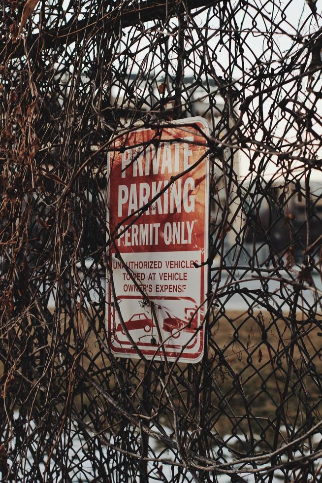 Red and white private parking permit-only sign photo