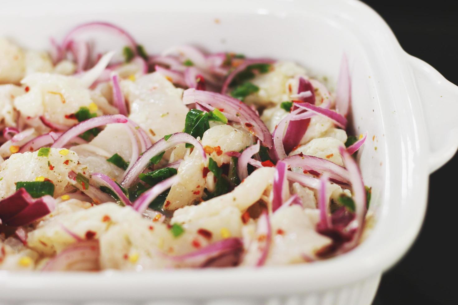 Sliced vegetables in ceramic bowl photo