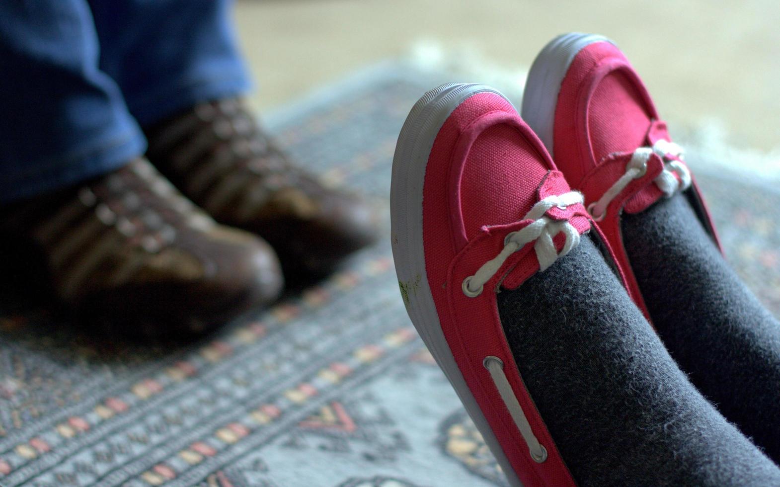 Pair of feet relaxing at home photo