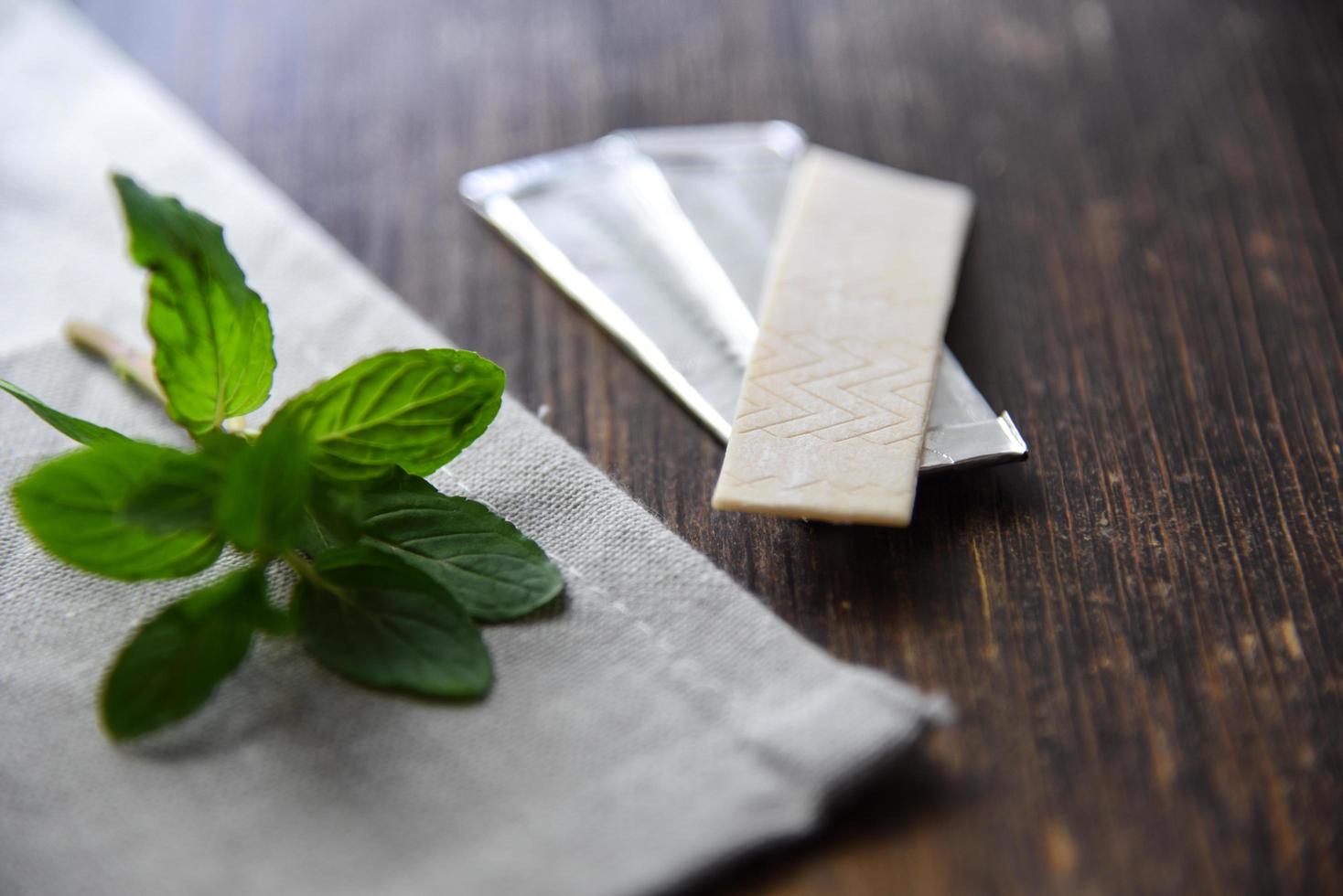 Chewing gum with mint leaves photo