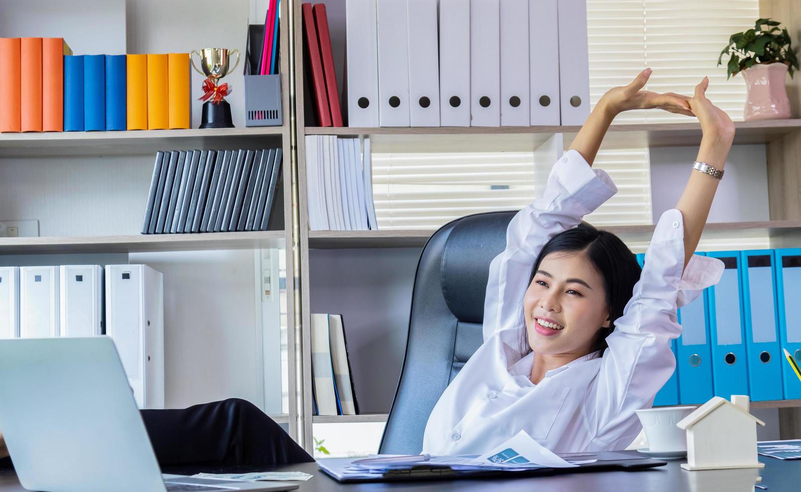 Businesswoman relaxing in office photo