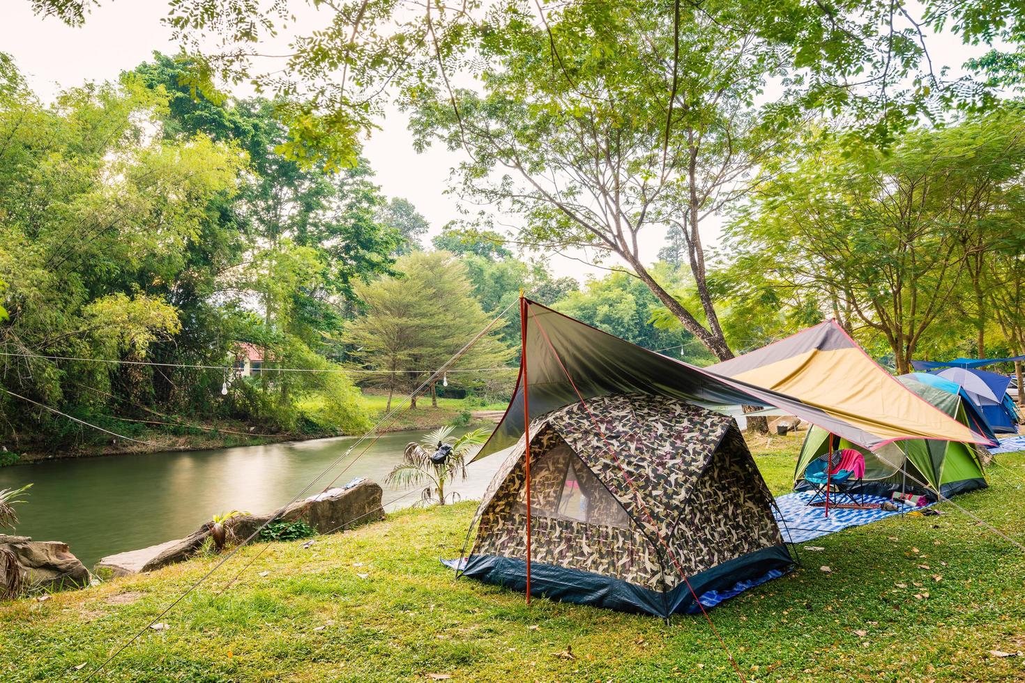 Camping tents on grass photo