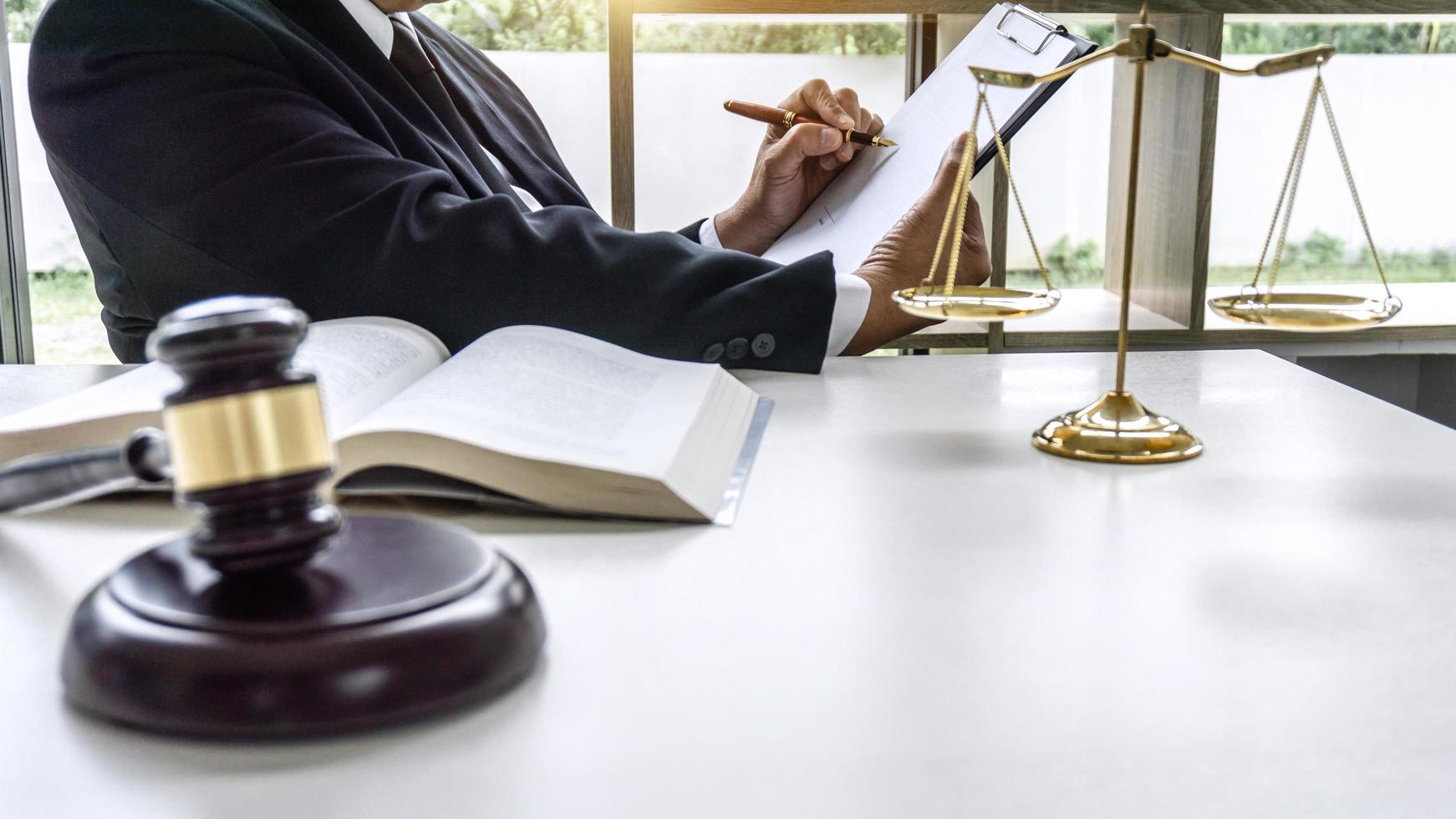 Male lawyer working on a documents  photo