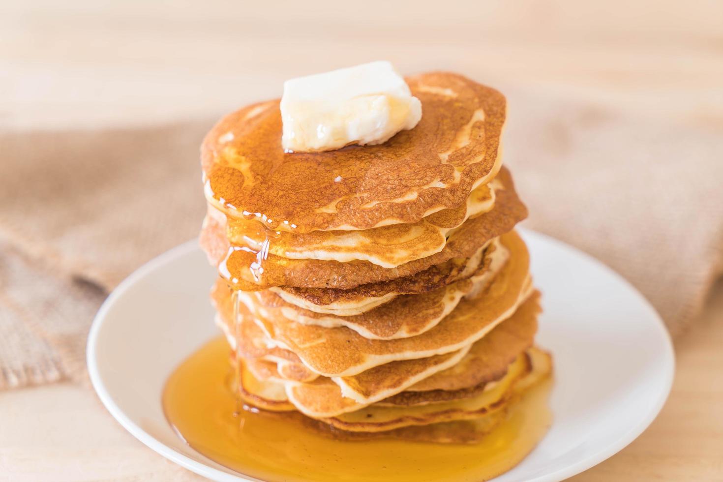 Cheese on pancakes with honey photo