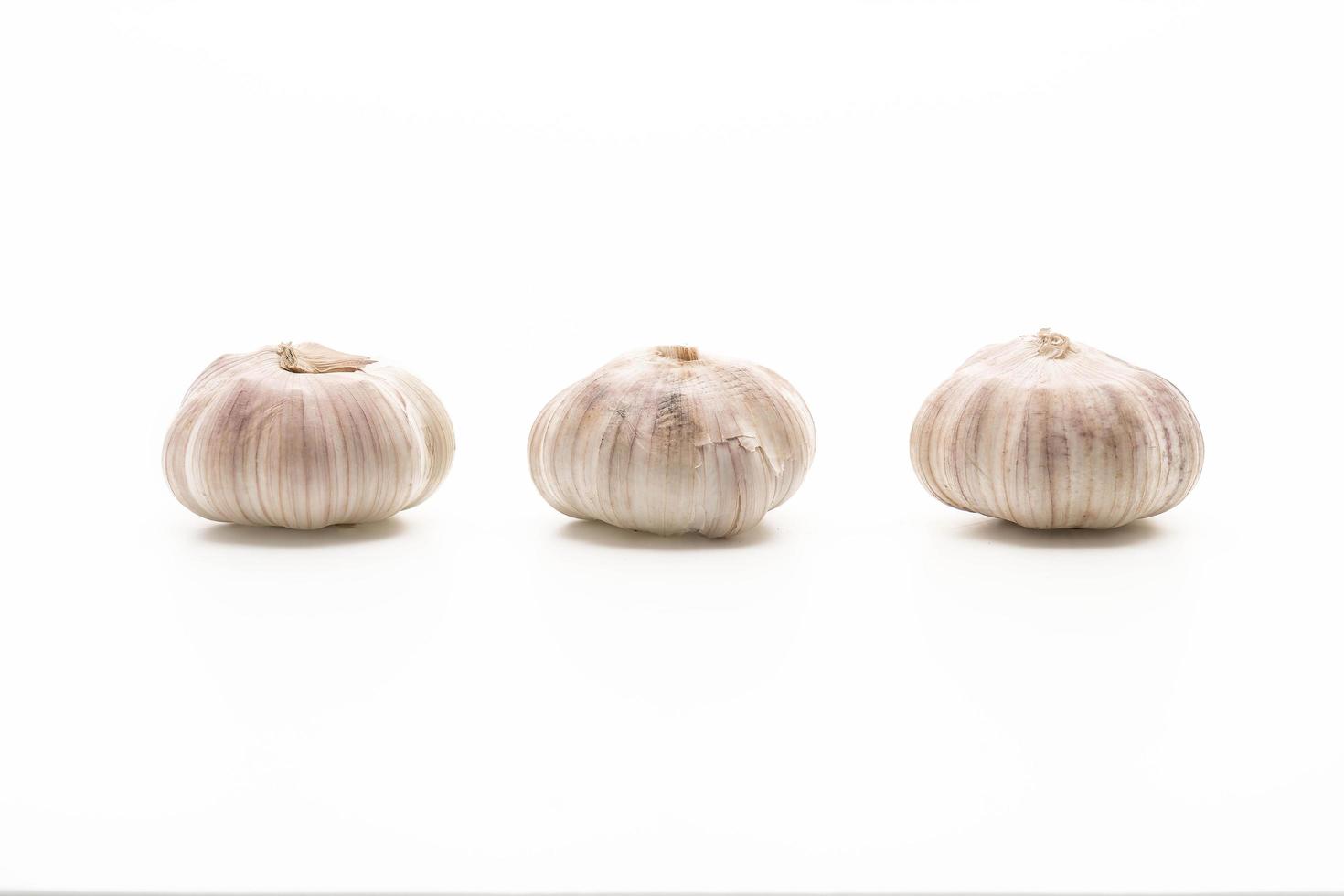 Garlic on white background photo