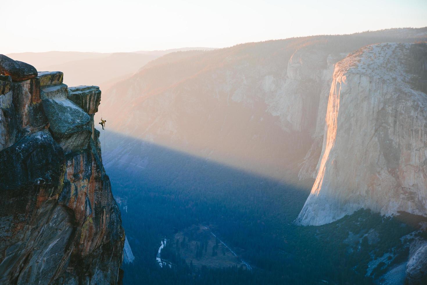 Man hanging from Taft Point photo