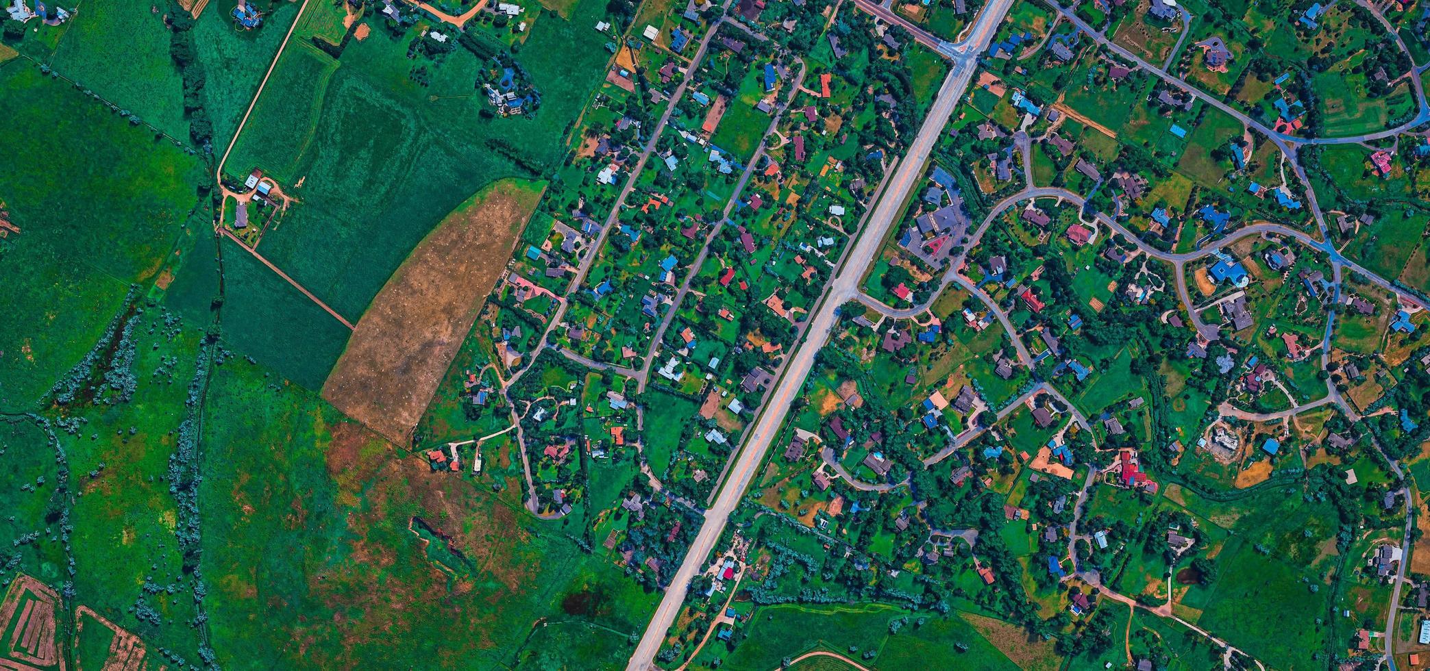 Aerial view of city, roads, and land photo