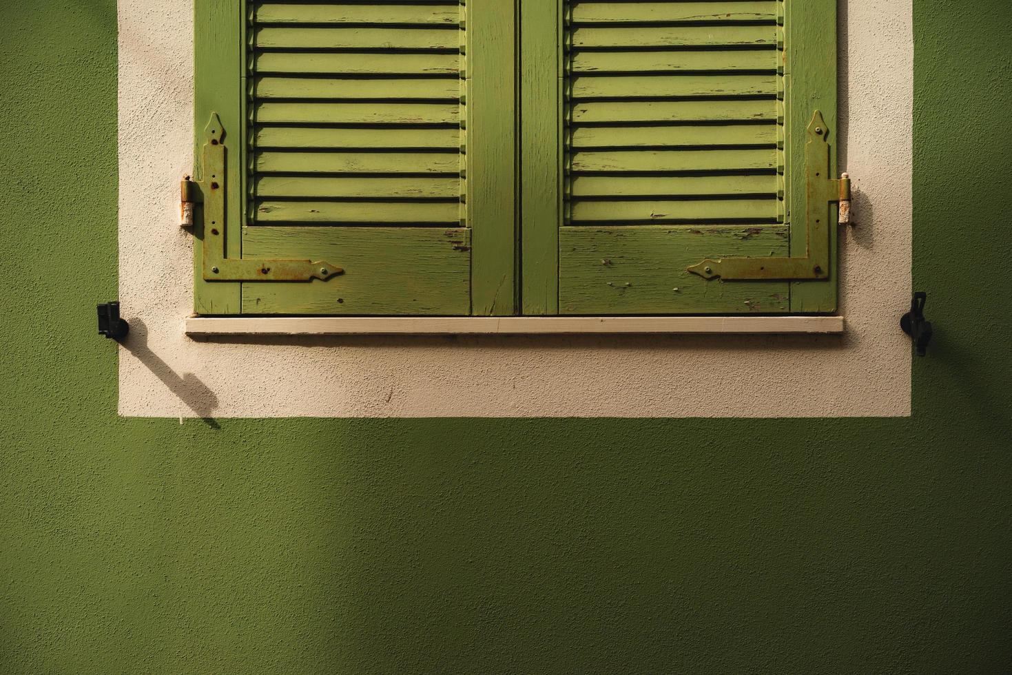 Closed green window photo