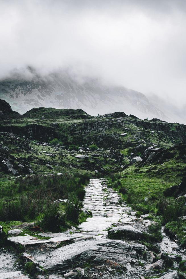 Rocky pathway leading to mountain  photo