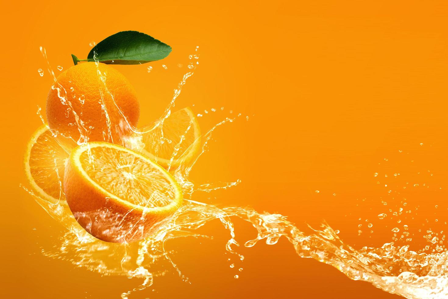 Water splashing on orange  photo