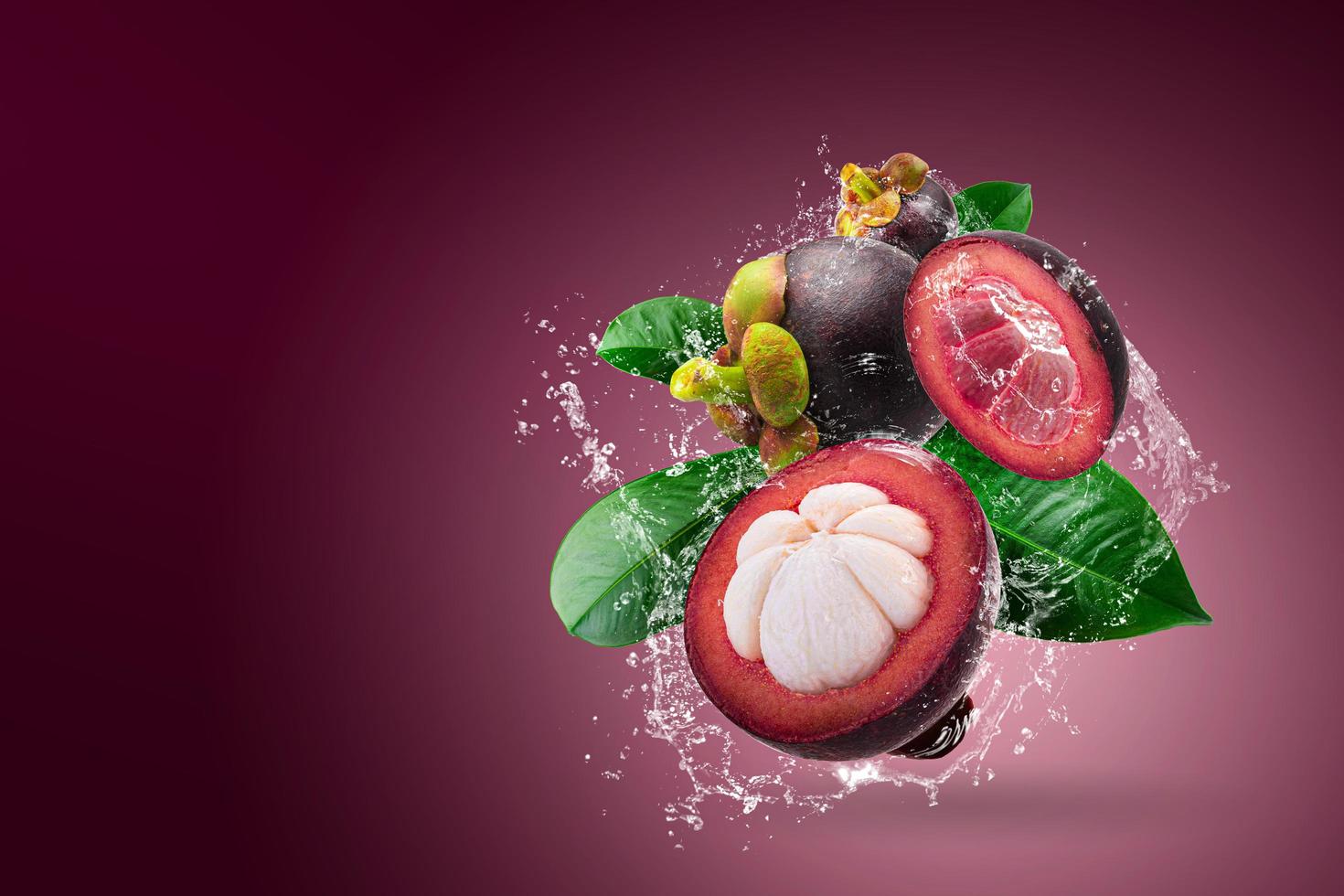 Water splashing on mangosteens  photo